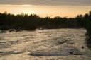 Kayakers on the Clark Fork River at Sunset